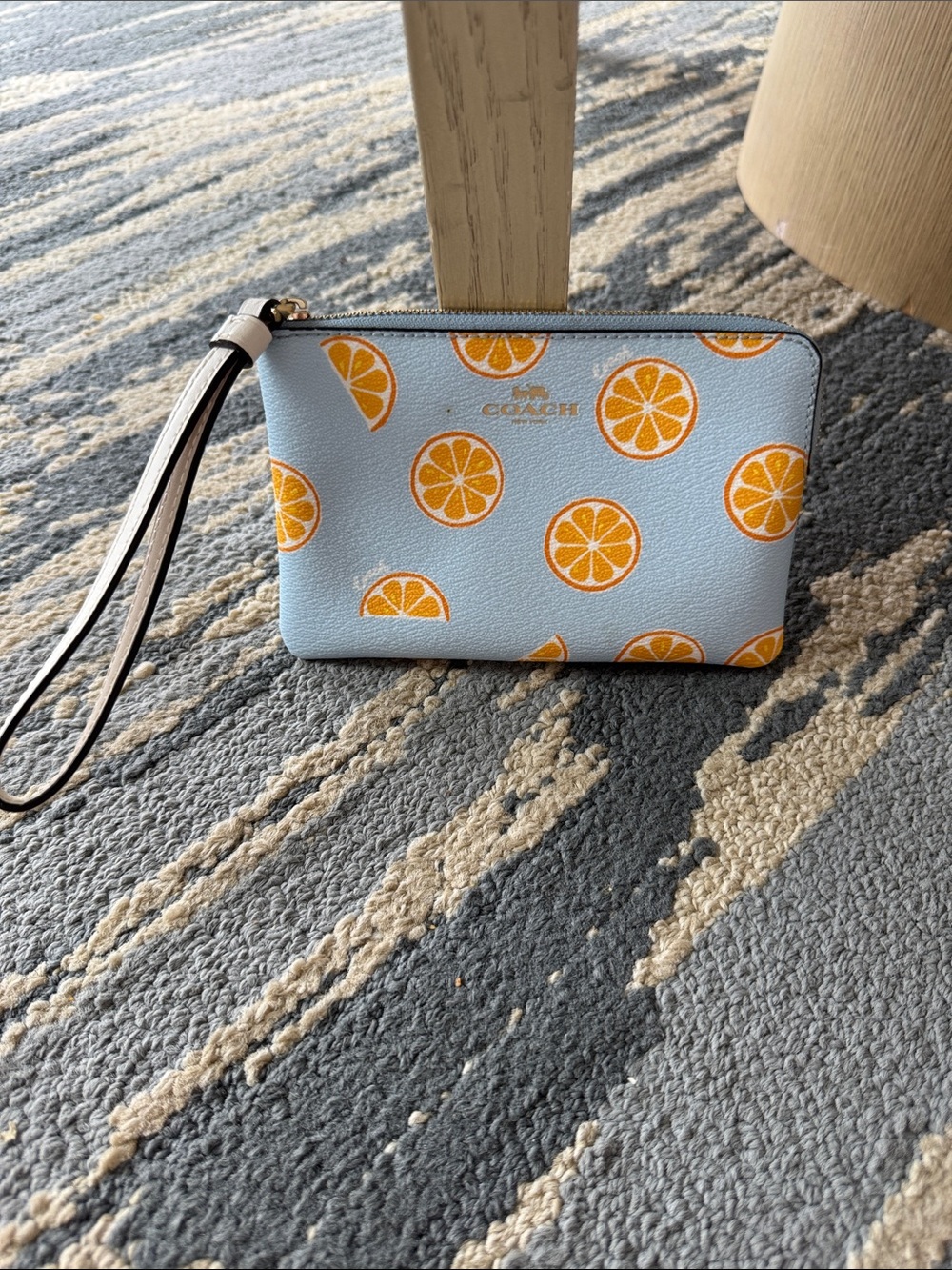 Coach Light Blue Wristlet with Orange Citrus Motif